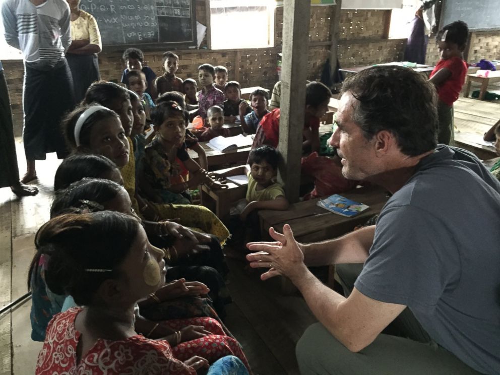 PHOTO: ABC News Bob Woodruff speaking with young children inside the refugee camps outside of Sittwe, Myanmar.
