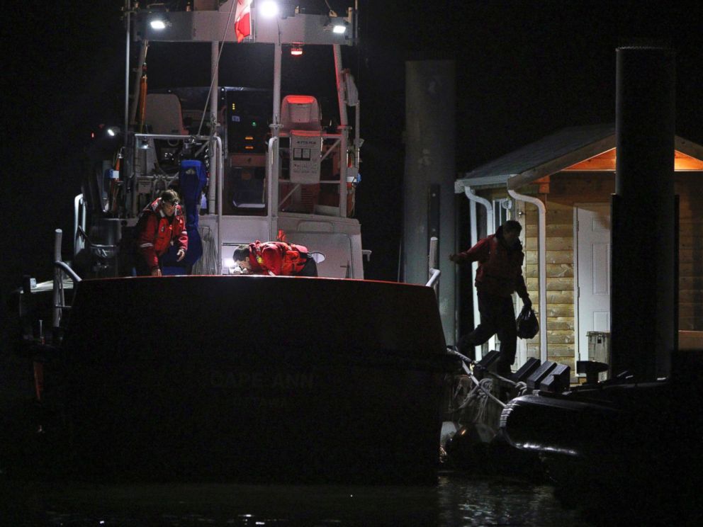 PHOTO: Canadian Coast Guard crew arrive at a dock in Tofino, west coast of Vancouver, Canada, early on Oct. 26, 2015, following a search and rescue operation.