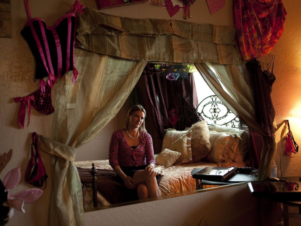 PHOTO: A sex worker waits for a client in the room where she works, Nov. 18, 2010 at the Carson City, Nev. location of Dennis Hofs Love Ranch brothel.