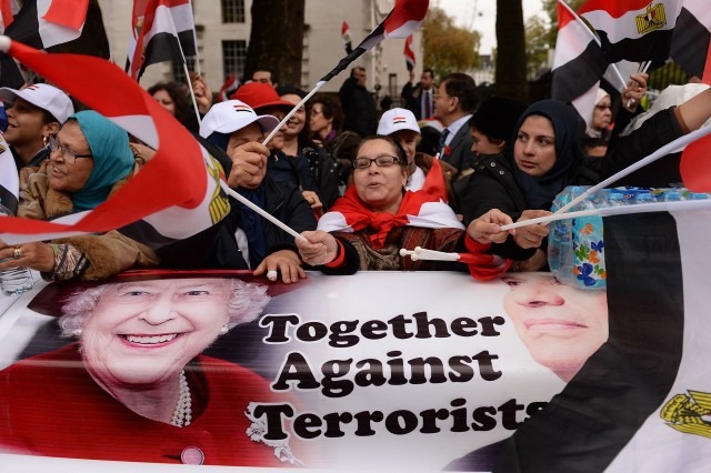 Supporters of the president also gathered outside Downing Street.