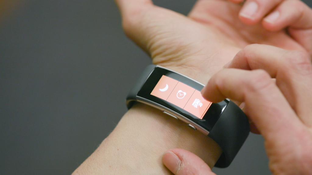 A close up of Jenna uisng her Microsoft Band.