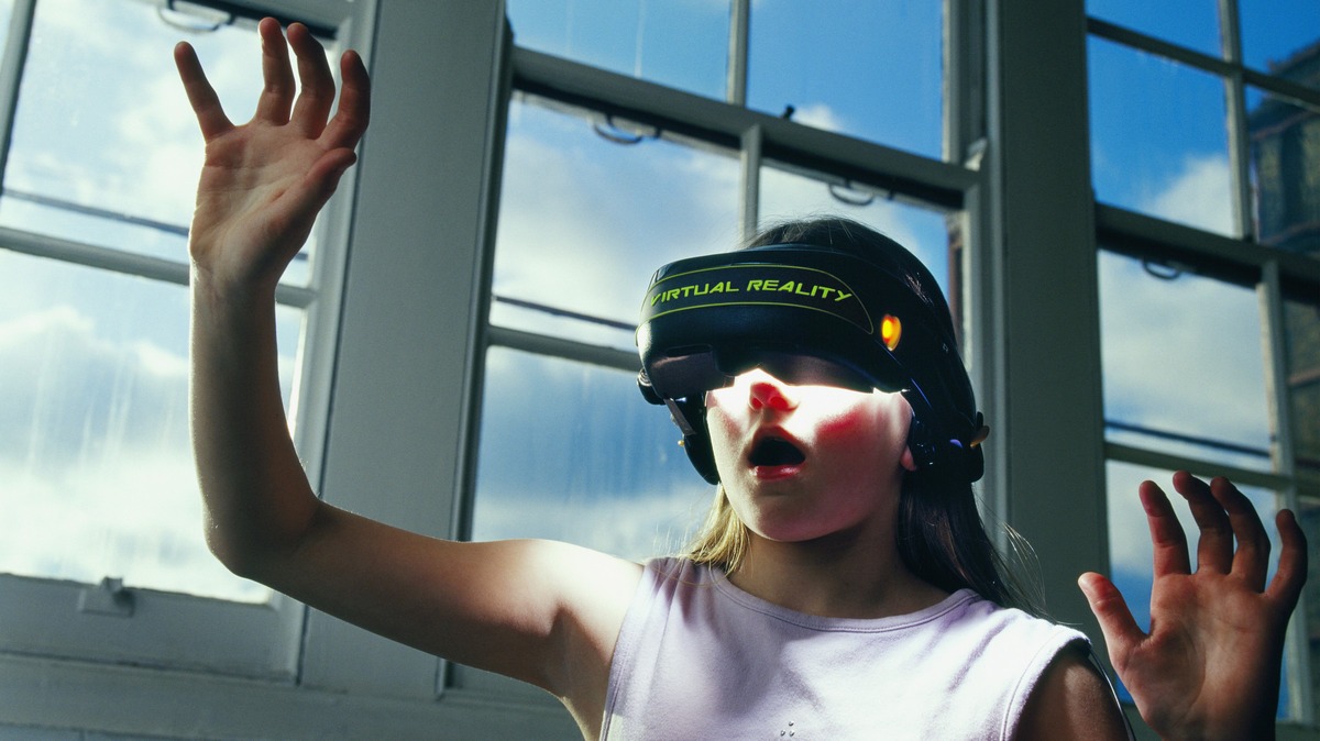 Girl Using Virtual Reality Simulator 